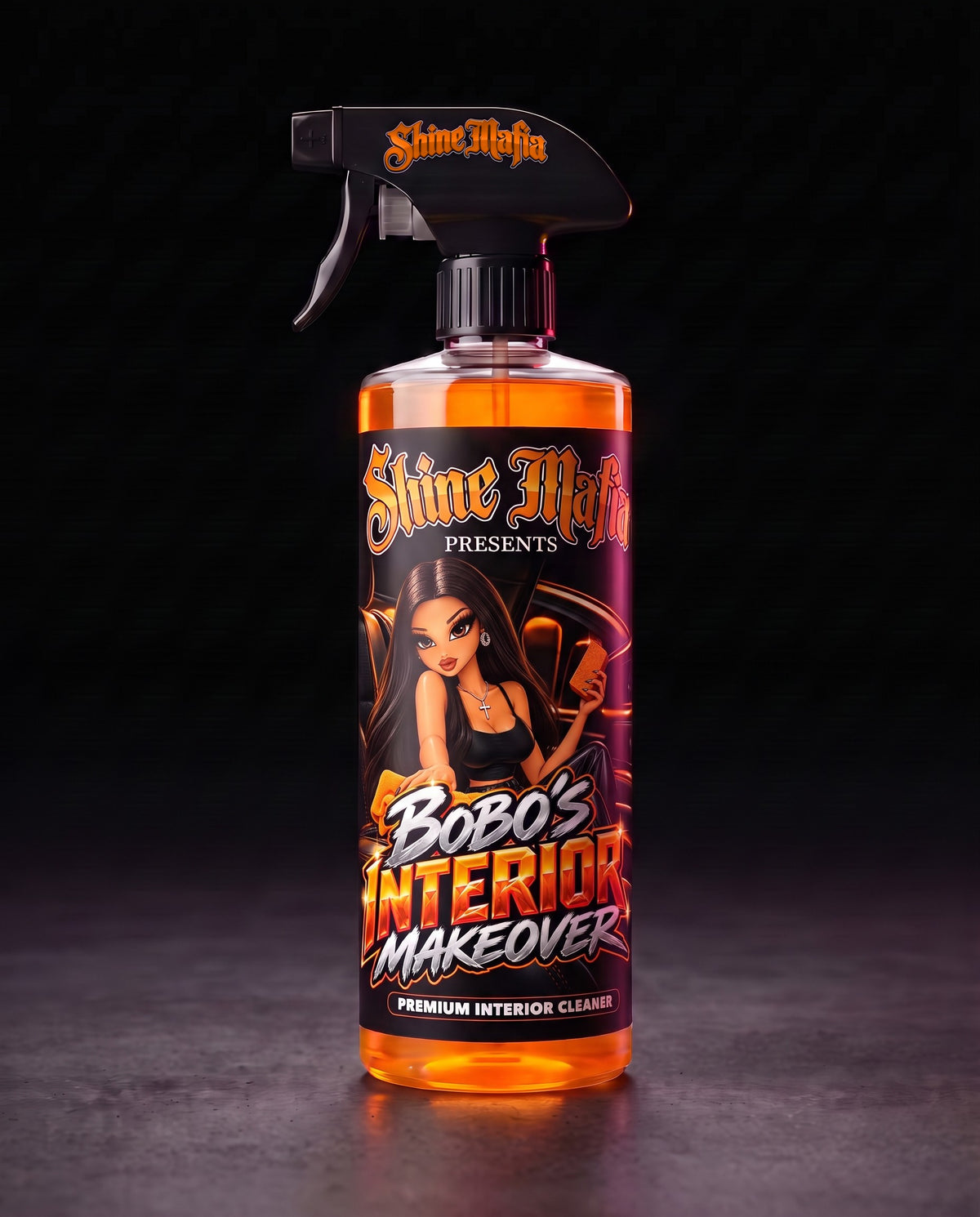 Bobo's Interior Makeover in a clear spray bottle with orange liquid
