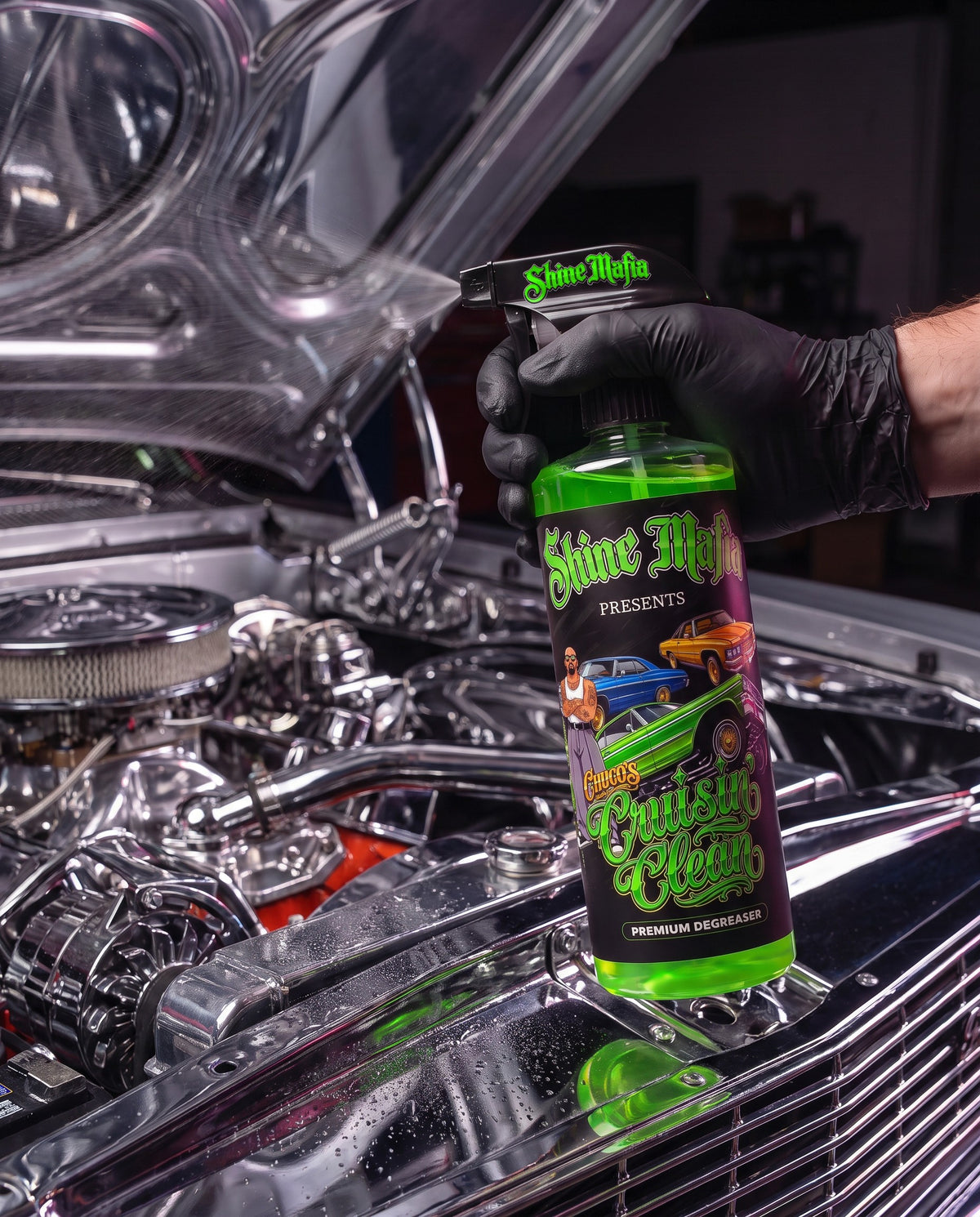 Spraying Chuco's Cruisin' Clean on a chrome engine bay